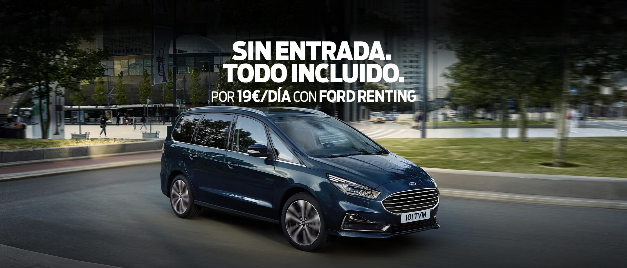 Ford Galaxy Titanium driving around the bend in city Ford Galaxy Titanium driving around the bend in city