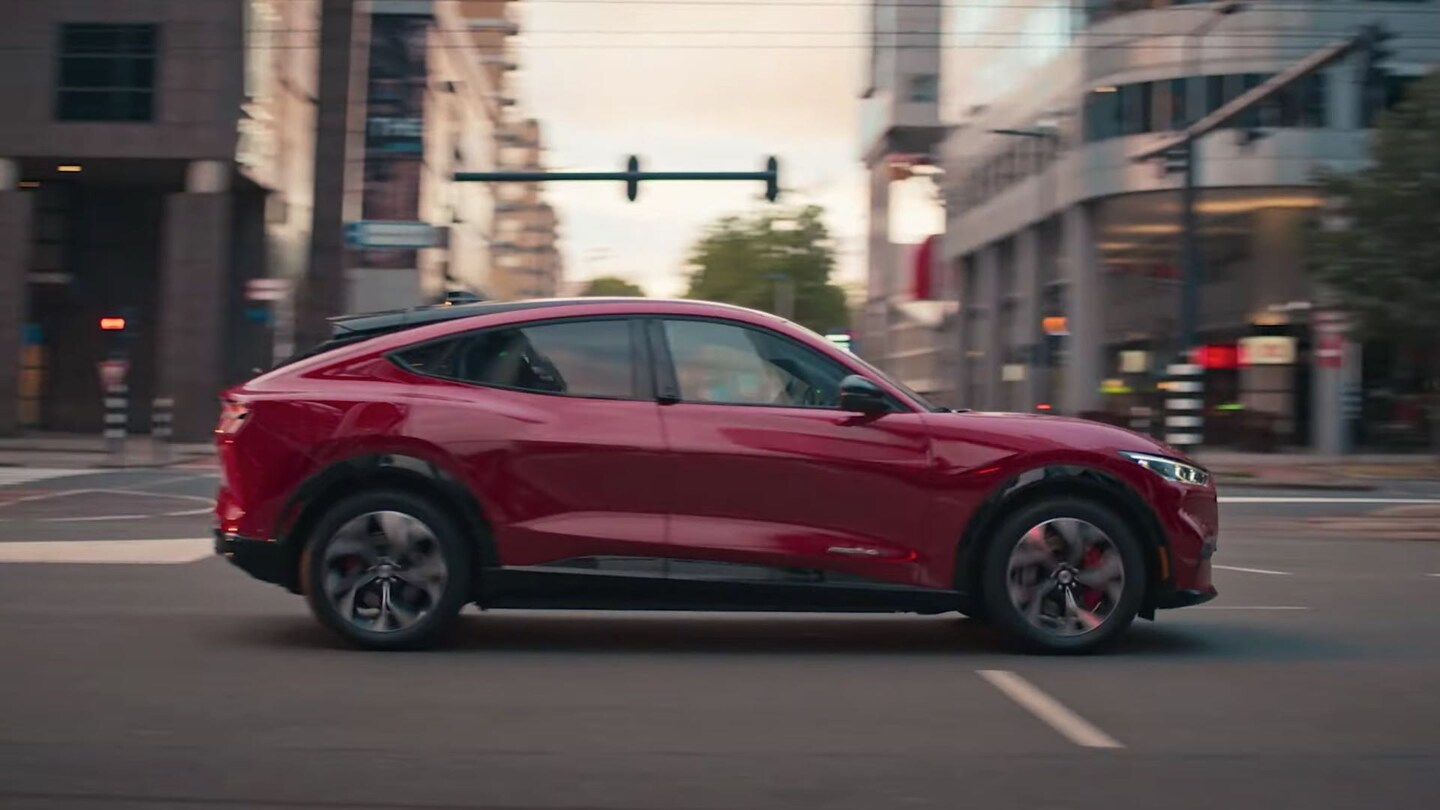 Side view of the a Ford car in motion