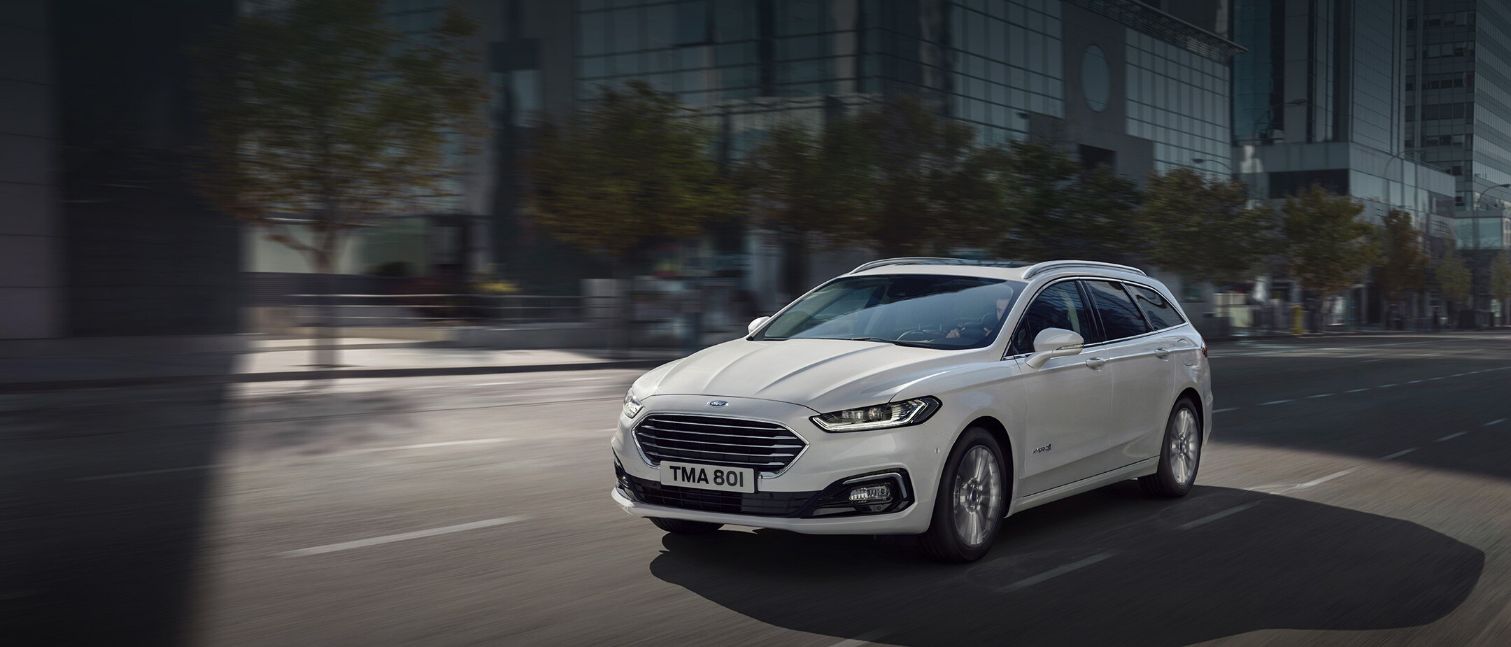Ford Mondeo Hybrid driving in city Ford Mondeo Hybrid driving in city