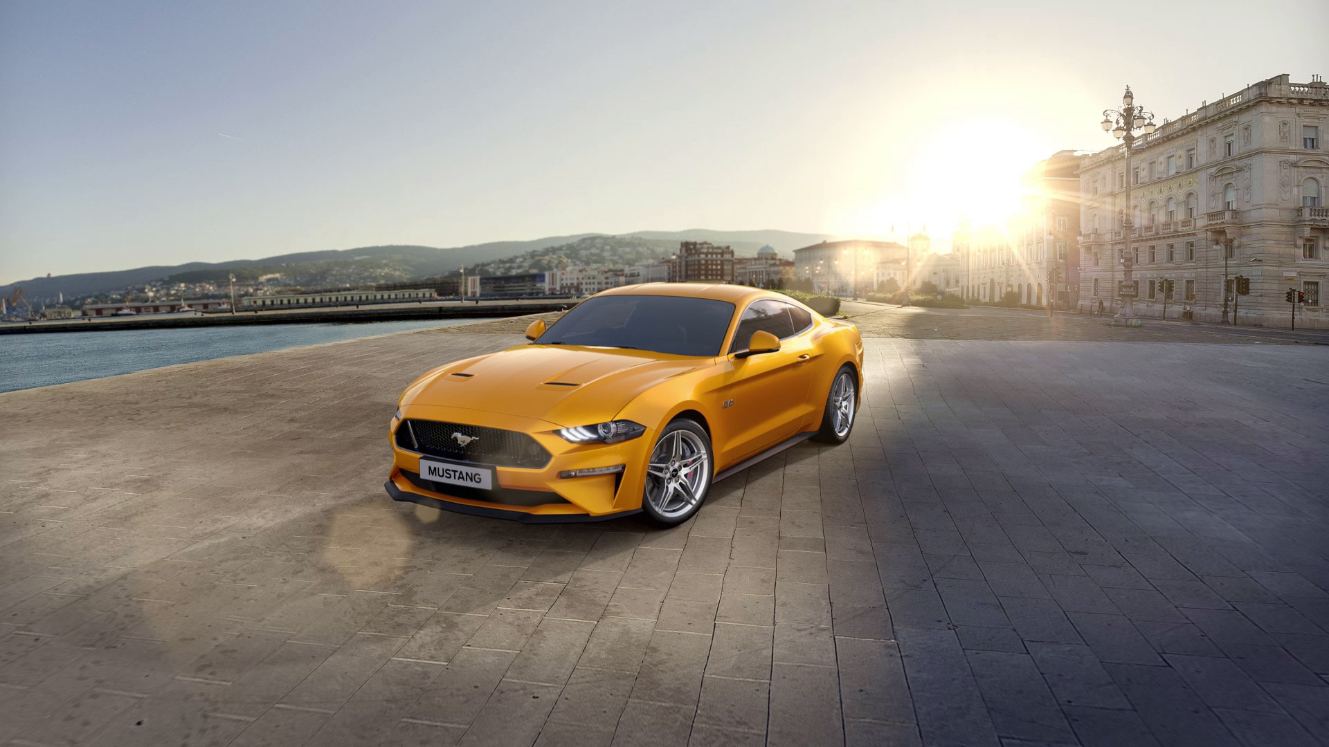 New Ford Mustang parked in town square by lake