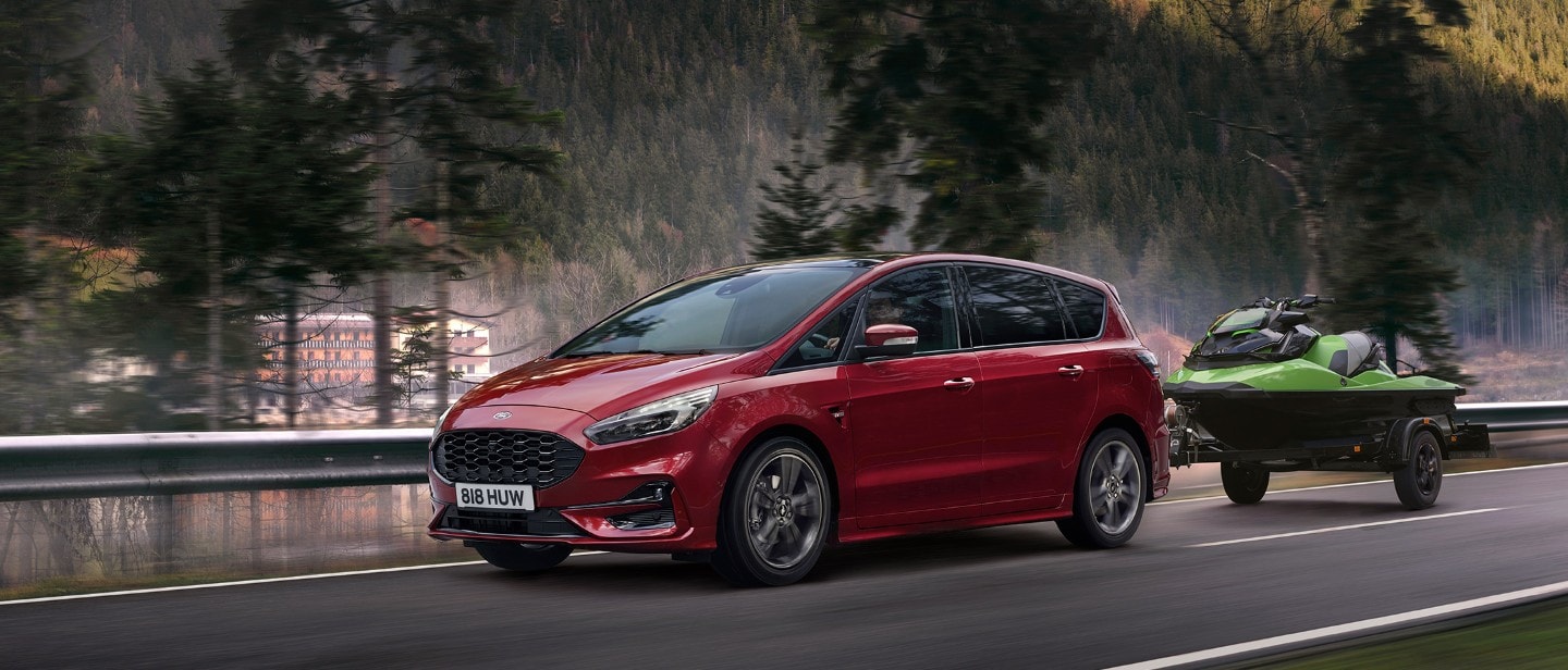 Ford S-MAX Hybrid driving across bridge side view