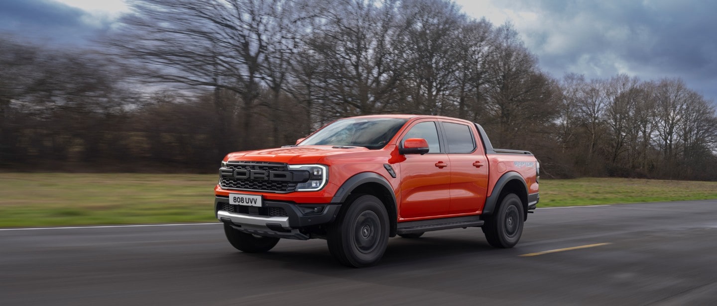 All-New Ford Ranger Raptor driving road front 3/4 view