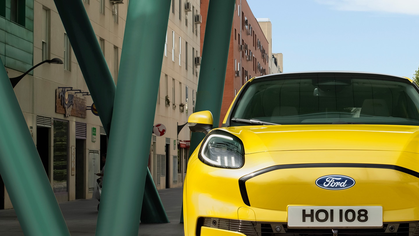 A close-up of the front of the new Ford Puma Gen-E® in yellow.