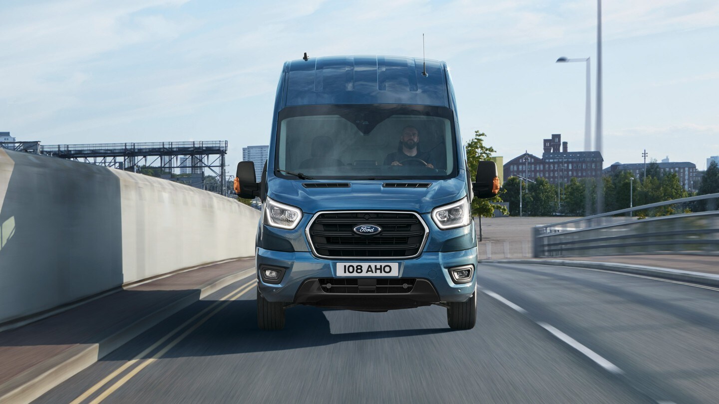 Ford Transit Van driving on highway front view