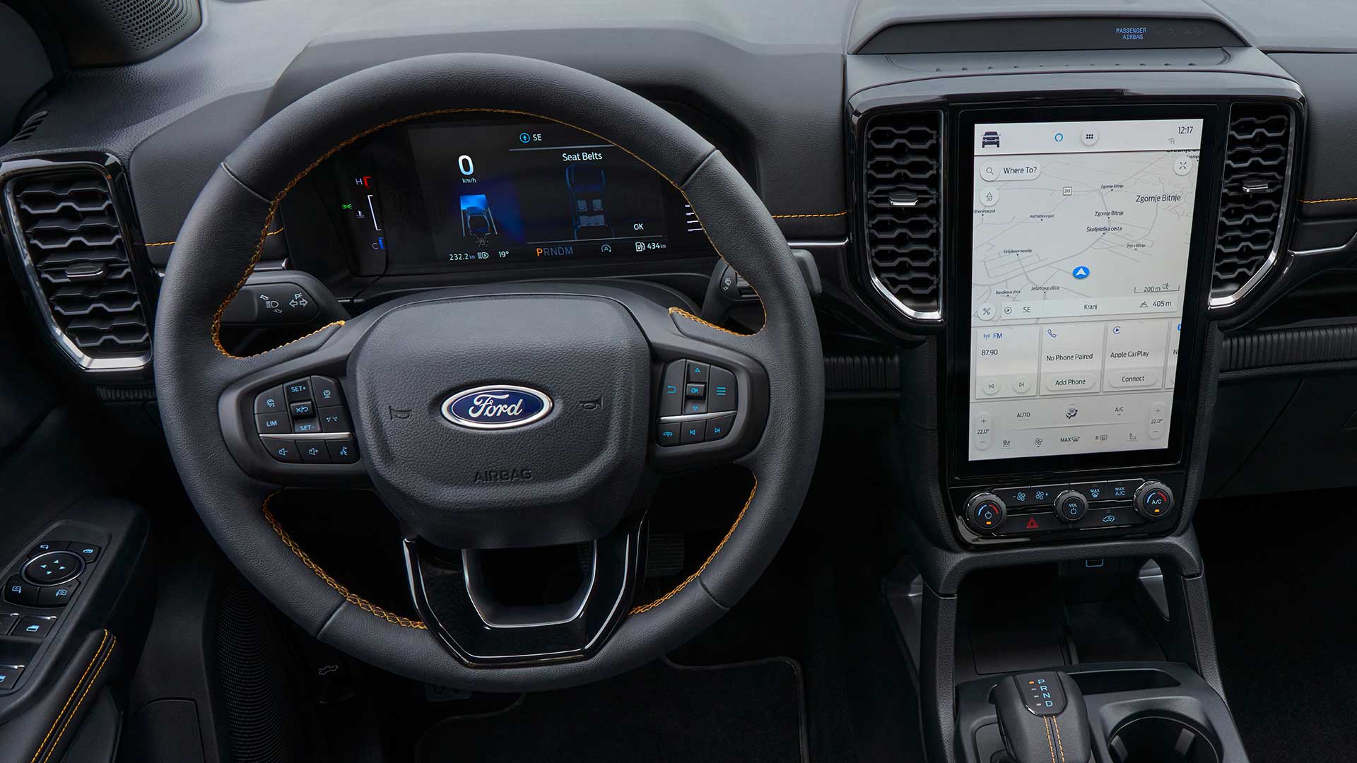 Vista interior del volante de un Ford Ranger y de la pantalla táctil central del sistema SYNC™ 4 de 12 pulgadas.