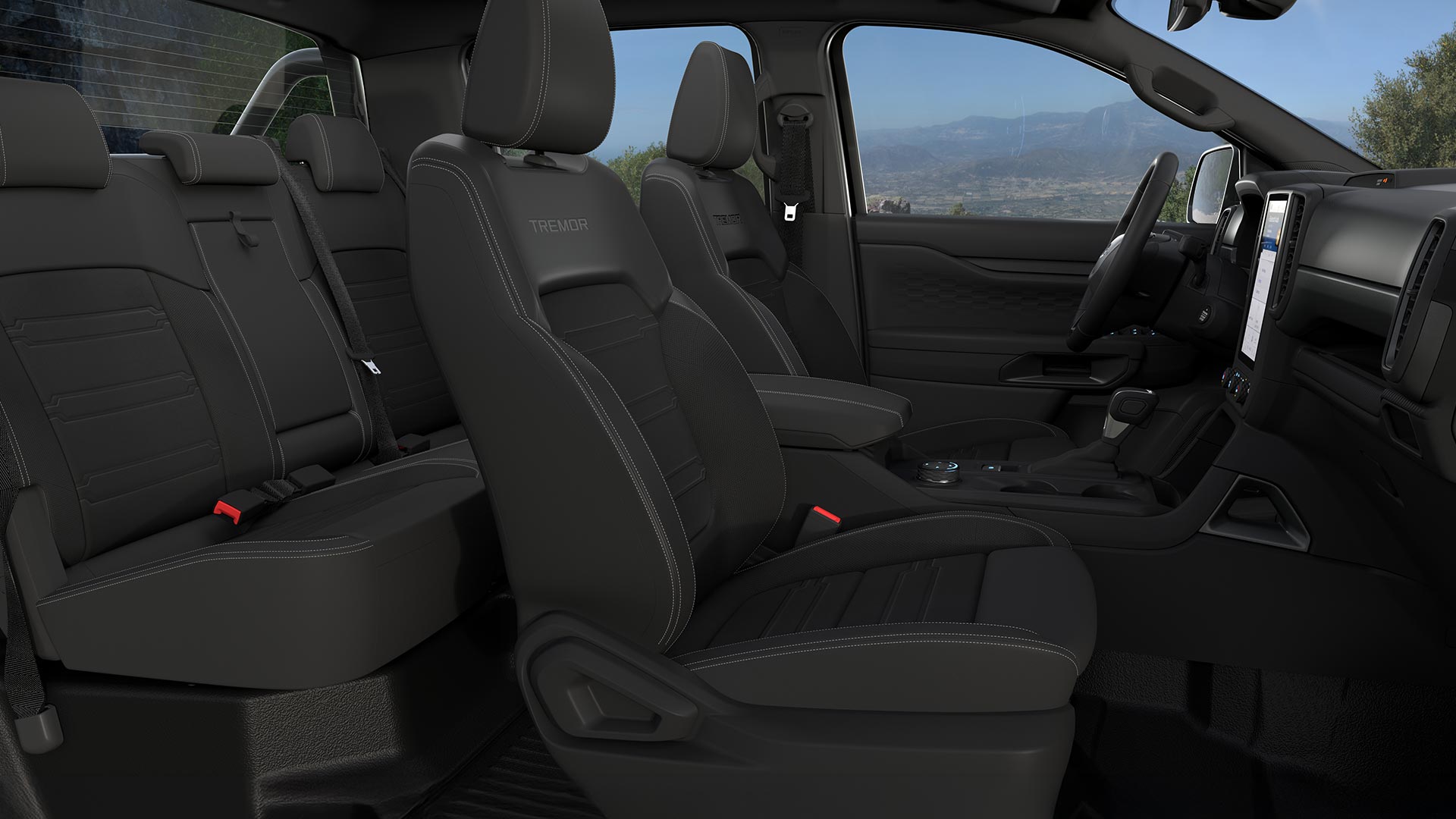 Imagen del interior de un Ford Ranger con doble cabina en la que se muestran los asientos delanteros.
