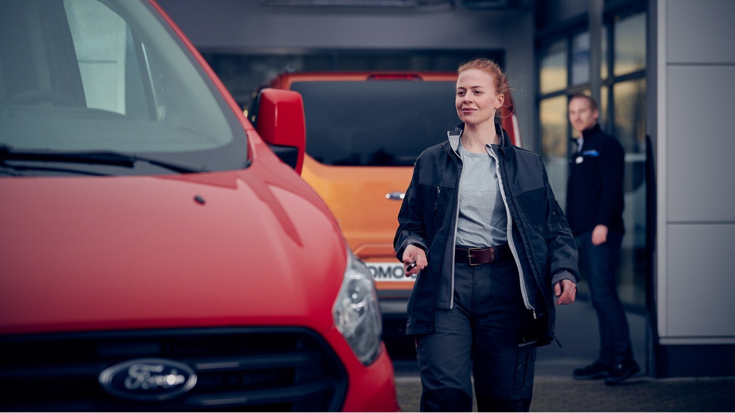 Woman collecting a replacement van