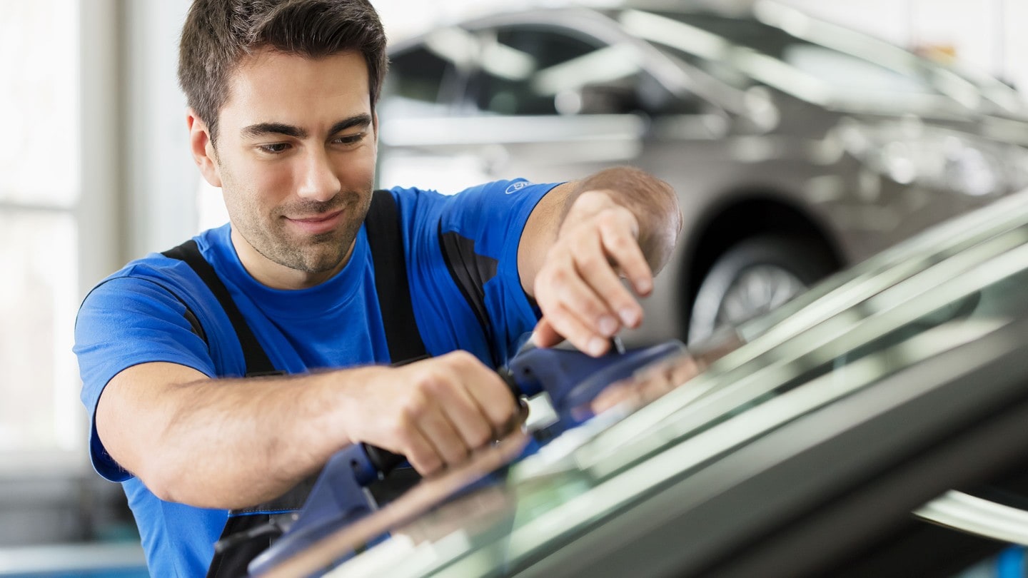 Ford Service engineers, inspecting vehicle