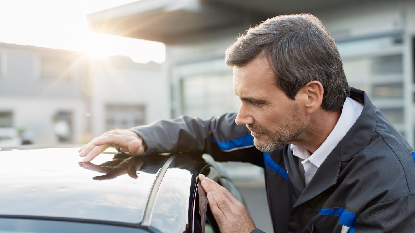 A man opening door of the car